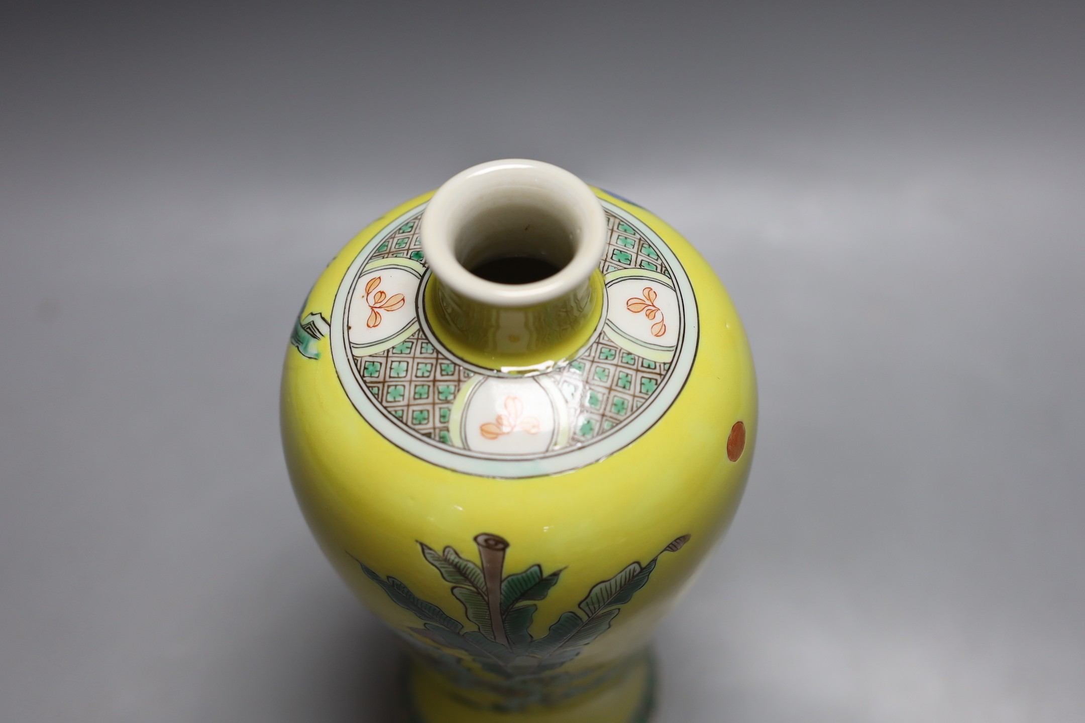 A Chinese yellow ground figural decorated baluster jar, 22cm